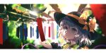  1girl aqua_eyes black_headwear blurry bow dappled_sunlight day depth_of_field dise grey_hair hat hat_ribbon highres komeiji_koishi letterboxed long_sleeves looking_away nail_polish outdoors paper portrait reaching ribbon short_hair smile solo sun_hat sunlight touhou wind_chime yellow_bow yellow_nails 