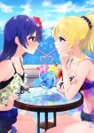  2girls arm_support ayase_eli bangs bikini blonde_hair blue_eyes blue_hair blush commentary_request crazy_straw day drink drinking drinking_straw food from_side fruit hair_between_eyes heart_straw highres lemon lemon_slice long_hair looking_at_another love_live! love_live!_school_idol_project multiple_girls nail_polish nanatsu_no_umi outdoors ponytail scrunchie shared_drink shared_straw sharing sipping sitting sonoda_umi staring staring_contest swimsuit tropical_drink yellow_eyes 