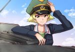  1girl blonde_hair blue_jacket blue_sky brown_eyes closed_mouth cloud cloudy_sky commentary day erwin_(girls_und_panzer) girls_und_panzer green_headwear green_shirt ground_vehicle hand_on_headwear hat highres jacket long_sleeves looking_at_viewer military military_hat military_uniform military_vehicle motor_vehicle omachi_(slabco) ooarai_military_uniform outdoors peaked_cap pointy_hair shirt short_hair sky smile solo tank tank_cupola uniform 