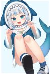  1girl :d absurdres agung_syaeful_anwar blue_background blue_eyes blue_hair blue_hoodie blue_legwear blue_nails claw_pose commentary english_commentary gawr_gura hands_up highres hololive hololive_english hood hood_up hoodie knees_up multicolored_hair nail_polish open_mouth shark_hood shark_tail sharp_teeth shoes silver_hair smile socks solo streaked_hair tail teeth two-tone_background virtual_youtuber white_background white_footwear 