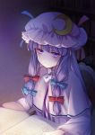  1girl blue_bow blue_ribbon blush book bookshelf bow capelet commentary crescent crescent_moon_pin dark eyebrows_visible_through_hair eyelashes hair_bow half-closed_eyes hat hat_ribbon jitome light long_hair looking_at_viewer mikagami_hiyori mob_cap open_book patchouli_knowledge purple_eyes purple_hair red_bow red_ribbon ribbon signature solo touhou upper_body watermark wide_sleeves 
