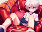  1boy blue_eyes blue_ribbon blue_shirt candy commentary_request couch eyebrows_visible_through_hair feet_out_of_frame food heart heart_pillow holding holding_candy holding_food holding_lollipop hunter_x_hunter killua_zoldyck lollipop long_sleeves looking_at_viewer male_focus messy_hair pillow pink_ribbon purple_shorts red_ribbon ribbon sayshownen shirt short_hair shorts sitting solo spiked_hair t-shirt turtleneck white_hair white_ribbon white_shirt 
