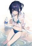 1girl absurdres arm_support bangs beach bikini black_hair blue_bikini bottle commentary_request crop_top day drawstring feet_out_of_frame groin hair_between_eyes haizome_senri highres holding holding_bottle hood hood_down hoodie navel original outdoors pink_eyes sand see-through short_sleeves sitting solo swimsuit water water_bottle white_hoodie 