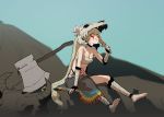  1girl :t animal_skull axe axe_warrior_(gogalking) bandaged_arm bandaged_leg bandages bare_shoulders barefoot black_choker blonde_hair boned_meat breasts bright_pupils choker cleavage closed_mouth eating food foot_dangle gogalking highres holding holding_food leaning_forward long_hair looking_at_viewer meat medium_breasts navel original planted_weapon sarashi skull_on_head solo stomach_tattoo tattoo very_long_hair waist_cape weapon white_pupils yellow_eyes 