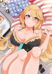  1girl american_flag american_flag_print black_bra blonde_hair blue_eyes blush bra breasts can cellphone cleavage collarbone flag_print frilled_bra frills highres iowa_(kantai_collection) kantai_collection komb large_breasts legs_up long_hair looking_at_viewer lying nintendo_switch on_back on_bed parted_lips phone pillow smartphone soda_can solo star-shaped_pupils star_(symbol) symbol-shaped_pupils underwear 