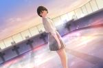  1girl blue_neckwear brown_eyes brown_hair empty_pool from_side grey_skirt highres looking_at_viewer nayuta69 neck_ribbon original pool ribbon school_uniform shirt short_hair skirt smile solo white_shirt 