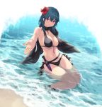  1girl belt bikini black_bikini black_footwear blue_eyes breasts byleth_(fire_emblem) byleth_(fire_emblem)_(female) cait cleavage commentary_request fire_emblem fire_emblem:_three_houses fire_emblem_heroes flower green_hair hair_flower hair_ornament hibiscus highres jewelry knife knife_holster large_breasts looking_at_viewer medium_hair navel necklace outstretched_hand partially_submerged sandals shawl sitting solo swimsuit wading wariza water 
