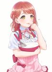  1girl apron arhah blush finger_to_mouth hair_ornament hairclip highres love_live! love_live!_nijigasaki_high_school_idol_club love_live!_school_idol_project neck_ribbon nijigasaki_academy_uniform orange_hair pink_apron red_neckwear ribbon school_uniform short_hair short_sleeves side_bun simple_background solo uehara_ayumu white_background yellow_eyes 