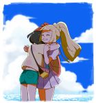  2girls bag beanie black_hair blonde_hair braid clenched_teeth closed_eyes cloud commentary_request crying dated day eyelashes green_shorts hat highres hug lillie_(pokemon) long_hair multiple_girls oh_juun outdoors pleated_skirt pokemon pokemon_(game) pokemon_sm ponytail red_headwear selene_(pokemon) shirt short_sleeves shorts shoulder_bag skirt sky tears teeth 