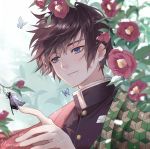  1boy antweiyi artist_name bangs black_hair black_jacket blue_eyes bug butterfly camellia closed_mouth collared_jacket flower flying hair_between_eyes hand_up haori insect jacket japanese_clothes kimetsu_no_yaiba light_smile looking_at_another male_focus outdoors short_hair signature snowing solo tomioka_giyuu tsurime upper_body 