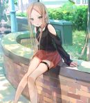  1girl abigail_williams_(fate/grand_order) alternate_costume arm_cutout bangs bare_shoulders black_shirt blonde_hair blush casual clothing_cutout commentary_request contemporary fate/grand_order fate_(series) feet_out_of_frame light_rays long_hair long_sleeves looking_at_viewer miniskirt open_mouth outdoors parted_bangs pleated_skirt red_skirt sakazakinchan shirt shoulder_cutout sitting skirt solo sunbeam sunlight thigh_strap tree 