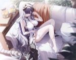  1girl absurdres august_von_parseval_(azur_lane) azur_lane black_hair black_skirt blue_eyes breasts cleavage cleavage_cutout closed_mouth clothing_cutout commentary_request couch g_home garter_straps hair_over_one_eye highres lace-trimmed_thighhighs large_breasts long_hair looking_at_viewer on_couch pillow sitting skirt solo thighhighs very_long_hair white_garter_straps white_thighhighs 