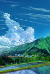  absurdres blue_sky cloud cloudy_sky cumulonimbus_cloud day forest grass highres mountain nature no_humans original outdoors railing reflection rural scenery sky smile_(qd4nsvik) town train tree water 