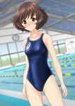  1girl absurdres akiyama_yukari arms_at_sides asics ass_visible_through_thighs bangs blue_swimsuit blurry blurry_background blush breasts brown_eyes brown_hair clothes_writing collarbone competition_swimsuit cowboy_shot depth_of_field embarrassed emblem eyebrows_visible_through_hair from_behind girls_und_panzer highres lane_line legs_apart logo looking_at_viewer multiple_views nose_blush one-piece_swimsuit pool poolside shiny shiny_hair short_hair small_breasts standing swept_bangs swimsuit takafumi thighs water wavy_hair 
