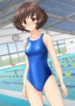  1girl absurdres akiyama_yukari arms_at_sides asics ass_visible_through_thighs bangs blue_swimsuit blurry blurry_background blush breasts brown_eyes brown_hair clothes_writing collarbone competition_swimsuit cowboy_shot depth_of_field embarrassed emblem eyebrows_visible_through_hair from_behind girls_und_panzer highres lane_line legs_apart logo looking_at_viewer multiple_views nose_blush one-piece_swimsuit pool poolside shiny shiny_hair short_hair small_breasts standing swept_bangs swimsuit takafumi thighs water wavy_hair 