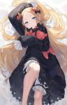  1girl abigail_williams_(fate/grand_order) arm_up bangs black_bow black_dress black_headwear blonde_hair blue_eyes bow breasts chorefuji dress fate/grand_order fate_(series) forehead hair_bow hat highres knee_up long_hair lying multiple_bows on_back open_mouth orange_bow parted_bangs ribbed_dress sleeves_past_fingers sleeves_past_wrists small_breasts stuffed_animal stuffed_toy teddy_bear white_bloomers 