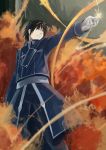  1boy absurdres azomo black_eyes black_hair black_pants blue_jacket closed_mouth feet_out_of_frame fire fullmetal_alchemist gloves hand_up highres jacket long_sleeves pants roy_mustang sanpaku short_hair solo standing waist_cape white_gloves 