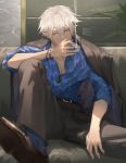  1boy absurdres aohitsugi_samatoki belt blue_legwear blue_shirt bracelet brown_footwear brown_jacket brown_pants cigarette earrings hair_between_eyes highres hypnosis_mic jacket jacket_on_shoulders jewelry knee_up looking_at_viewer male_focus necklace pants piercing plant red_eyes shirt sitting sleeves_rolled_up smoke_trail smoking solo unbuttoned unbuttoned_shirt white_hair window xia_qing 