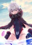  1girl akasaka_asa azur_lane bangs black_gloves black_swimsuit blue_sky brown_cloak candy cloak cloud day fang food gloves grey_eyes grey_hair highleg highleg_swimsuit highres holding holding_candy holding_food holding_lollipop hood hood_down hooded_cloak lollipop ocean one-piece_swimsuit open_mouth outdoors partially_submerged sky solo swimsuit swirl_lollipop thighhighs u-110_(azur_lane) white_legwear 