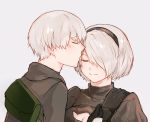  1boy 1girl bag black_gloves black_hairband breasts cleavage cleavage_cutout closed_eyes closed_mouth clothing_cutout eyebrows_visible_through_hair gloves green_bag grey_background grey_hair hair_over_one_eye hairband highres kiss mole mole_under_mouth nier_(series) nier_automata puffy_sleeves short_hair simple_background smile turtleneck upper_body wu_ye_bifang yorha_no._2_type_b yorha_no._9_type_s 