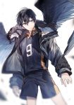  1boy artist_name bangs black_hair black_jacket black_shirt black_shorts black_wings blue_eyes closed_mouth collared_shirt cowboy_shot falling_feathers feathered_wings fur_trim haikyuu!! hair_between_eyes jacket kageyama_tobio long_sleeves looking_away male_focus shirt short_hair shorts simple_background solo sportswear standing sukja tsurime volleyball_uniform white_background wings 