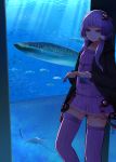  1girl animal aquarium arano_oki bangs black_jacket closed_mouth collarbone commentary_request dress eyebrows_visible_through_hair fish hair_ornament headset highres holding hood hood_down hooded_jacket indoors jacket long_hair long_sleeves open_clothes open_jacket purple_dress purple_eyes purple_hair purple_legwear ribbed_legwear smile solo standing thighhighs voiceroid water yuzuki_yukari 