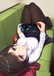 1girl bangs black_hair black_skirt blue_eyes blush breasts brown_legwear cellphone collared_shirt commentary_request couch dress_shirt eliot_c_f eyebrows_visible_through_hair highres holding indoors knees_up looking_at_viewer lying nintendo_switch no_shoes on_back on_couch original pantyhose parted_lips phone pleated_skirt school_uniform shirt skirt small_breasts solo white_shirt 