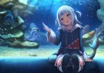  1girl anemone_noa aquarium arm_up backlighting bloop_(gawr_gura) blue_eyes blue_hair blue_hoodie blush commentary coral dot_nose eel fish fish_tail full_body gawr_gura hair_ornament head_tilt hololive hololive_english hood hoodie indoors legs_up light_rays looking_at_another multicolored_hair open_mouth panties pantyshot sand shark shark_hair_ornament shark_tail sharp_teeth silver_hair sitting smile solo streaked_hair sunbeam sunlight tail teeth two_side_up underwear upper_teeth waving 