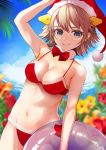  1girl bikini blue_eyes blue_sky blurry brown_hair cloud commentary_request cowboy_shot cryptogam day depth_of_field flipped_hair flower fur-trimmed_bikini fur_trim hairband headgear hiei_(kantai_collection) highres innertube kantai_collection looking_at_viewer outdoors palm_leaf red_bikini short_hair sky solo swimsuit 