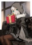  1girl bangs black_gloves blush boots border box brown_legwear cape commentary_request couch fate_(series) feet_out_of_frame fur_trim gift gift_box gloves gray_(lord_el-melloi_ii) green_eyes grey_hair hair_between_eyes hands_up highres holding holding_box hood hood_up long_sleeves looking_at_viewer lord_el-melloi_ii_case_files mocha_(mokaapolka) on_couch pantyhose short_hair signature sitting skirt smile solo white_border 