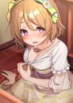  1girl arm_support bangs blush bow breasts brown_hair cleavage collarbone commentary_request dress eyebrows_visible_through_hair floral_print green_dress hair_between_eyes hair_bow highres indoors jewelry koizumi_hanayo long_sleeves looking_at_viewer love_live! love_live!_school_idol_project medium_breasts necklace parted_lips print_dress purple_eyes shipii_(jigglypuff) shirt shirt_pull smile solo striped striped_bow white_shirt 