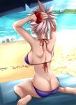  1girl adjusting_hair ass beach beach_towel bikini breasts butt_crack earrings fate/grand_order fate_(series) from_behind highres jewelry large_breasts miyamoto_musashi_(fate/grand_order) miyamoto_musashi_(swimsuit_berserker)_(fate) nagishy nape pink_hair scrunchie shade shoulder_blades sitting solo swimsuit swimwear towel water 