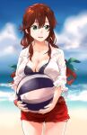  1girl ball bangs beach beachball bikini black_bikini blue_sky braid breasts brown_hair cleavage cloud collarbone commentary_request cowboy_shot day facing_viewer furufuru_fugu green_eyes highres kantai_collection large_breasts noshiro_(kantai_collection) outdoors red_shorts shirt shorts sideways_glance sky solo standing swept_bangs swimsuit twin_braids white_shirt 