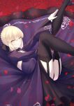  1girl absurdres artoria_pendragon_(all) bangs black_dress black_legwear blonde_hair braid breasts dress fate/grand_order fate/stay_night fate_(series) french_braid fuwatoromonta garter_straps highres legs_up long_hair long_sleeves looking_at_viewer lying on_back petals saber_alter thighhighs yellow_eyes 