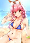  1girl animal_ear_fluff animal_ears beach bikini blue_bikini breasts collarbone day eyebrows_visible_through_hair fate/grand_order fate_(series) fox_ears fox_girl fox_tail groin highres large_breasts looking_at_viewer navel noir_(nowaru) ocean pink_hair side-tie_bikini signature sitting solo sweat swimsuit swimwear tail tamamo_(fate)_(all) tamamo_no_mae_(swimsuit_lancer)_(fate) 