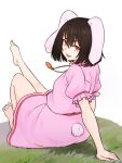 1girl animal_ears arm_support bangs barefoot black_hair bunny_ears bunny_tail carrot_necklace floppy_ears frilled_sleeves frills from_behind full_body grass hair_between_eyes highres inaba_tewi kakone leg_up looking_at_viewer open_mouth pink_shirt pink_skirt red_eyes shirt short_hair short_sleeves simple_background sitting skirt skirt_set smile solo tail touhou white_background 