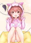  1girl animal_hood bangs blush breasts brown_eyes brown_hair bubble_background cat_hood claw_pose commentary demon_tail drawstring eyebrows_visible_through_hair fang feet_out_of_frame highres hood hood_up hoodie horns ikemoto1001 large_breasts long_hair looking_at_viewer loungewear machikado_mazoku open_mouth panties pantyshot paw_print pillow sidelocks simple_background sitting_on_pillow solo tail underwear white_panties yoshida_yuuko_(machikado_mazoku) 