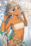  1girl ahoge bare_shoulders bikini blue_eyes blue_ribbon bracelet collarbone dark_skin dark_skinned_female eyebrows_visible_through_hair flat_chest hair_between_eyes hair_ribbon highres jewelry long_hair looking_at_viewer lying navel on_back original parted_lips ran&#039;ou_(tamago_no_kimi) ribbon silver_hair solo swimsuit tan white_bikini 