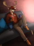  2021 absurd_res anthro antlers beverage bottomwear brown_body brown_fur cellphone cervid clothing cup eyewear fur furniture glasses hi_res hoodie horn male mammal mykegreywolf pants phone pillow sitting smartphone smile sofa solo topwear 