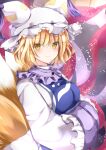  1girl bangs blonde_hair blush breasts closed_mouth dress eyebrows_visible_through_hair fox_tail hair_between_eyes hands_in_opposite_sleeves hat long_sleeves looking_at_viewer medium_breasts multiple_tails nanase_nao pillow_hat sleeves_past_fingers sleeves_past_wrists smile solo tabard tail touhou white_dress white_headwear wide_sleeves yakumo_ran yellow_eyes 