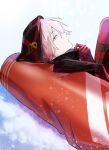  1boy bangs black_coat blue_eyes coat coffeekite eyeshadow fate/grand_order fate_(series) gloves hair_over_one_eye highres hood hood_up karna_(fate) karna_(santa)_(fate) long_sleeves looking_at_viewer makeup pale_skin red_gloves sandbag short_hair snow white_hair 