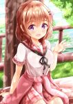  1girl :d arm_support bangs black_ribbon blush breasts brown_hair commentary_request day eyebrows_visible_through_hair fence gochuumon_wa_usagi_desu_ka? hair_between_eyes hair_ornament hairclip hand_up highres hoto_cocoa looking_at_viewer medium_breasts neck_ribbon on_bench open_mouth outdoors plaid plaid_sailor_collar plaid_skirt purple_eyes red_sailor_collar red_skirt ribbon river sailor_collar school_uniform serafuku shirt short_sleeves sitting skirt smile solo tree water white_shirt zenon_(for_achieve) 
