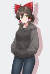  1girl absurdres bangs black_hoodie black_shirt blue_pants blush bow brown_eyes brown_hair closed_mouth commentary_request cookie_(touhou) cowboy_shot denim drop_shadow frilled_bow frills gnzy grey_background hair_bow hair_tubes hakurei_reimu hands_in_pockets highres hood hoodie jeans long_sleeves looking_to_the_side maru_(cookie) pants red_bow shirt short_hair simple_background solo standing touhou 