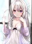  1girl azur_lane blue_eyes blush breasts cleavage collarbone frosted_glass grey_hair hair_ribbon heart heterochromia highres long_hair medium_breasts murmansk_(azur_lane) murmansk_(sceneries_of_pure_snow)_(azur_lane) official_alternate_costume purple_eyes ribbon see-through_sleeves sidelocks smile solo tress_ribbon umidemi white_nightgown window 