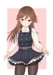  1girl arashio_(kancolle) bell_shireikan belt black_legwear blush brown_eyes brown_hair cowboy_shot dress eyebrows_visible_through_hair frilled_dress frills hair_between_eyes highres kantai_collection long_hair long_sleeves looking_at_viewer pantyhose pinafore_dress pink_background shirt skirt solo standing thighband_pantyhose two-tone_background white_background white_shirt yellow_eyes 