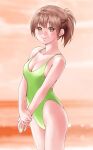  1girl absurdres breasts brown_eyes brown_hair casual_one-piece_swimsuit cleavage commentary_request cowboy_shot green_swimsuit highres lips looking_at_viewer macosee medium_breasts one-piece_swimsuit orange_background original ponytail short_hair solo standing swimsuit v_arms 