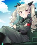  1girl anchovy_(girls_und_panzer) anzio_military_uniform bangs belt black_belt black_neckwear black_ribbon black_shirt blue_sky boots carro_armato_p40 cloud cloudy_sky commentary crossed_arms crossed_legs day dress_shirt drill_hair eyebrows_visible_through_hair girls_und_panzer green_hair grey_jacket grey_pants grin ground_vehicle hair_ribbon highres jacket knee_boots long_hair long_sleeves looking_at_viewer military military_uniform military_vehicle motor_vehicle necktie on_vehicle outdoors pants red_eyes ribbon riding_crop sam_browne_belt shirt sitting sky smile solo tank twin_drills twintails uniform wing_collar yunekoko 