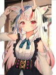  1girl animal_ear_fluff animal_ears blue_neckwear blurry blurry_background blush bow bowtie cat_ears clothing_cutout commentary highres hololive horns indoors kemonomimi_mode long_hair long_sleeves maid_headdress multicolored_hair nakiri_ayame razerman121 red_eyes red_hair shoulder_cutout silver_hair smile solo streaked_hair upper_body virtual_youtuber 