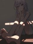  1girl absurdres ahoge arm_support bare_legs barefoot blurry blurry_foreground braid dark depth_of_field elaina_(majo_no_tabitabi) hand_up highres lan_mao_akko light_particles looking_at_viewer majo_no_tabitabi parted_lips purple_eyes purple_hair sitting smile soles solo strap_slip toes twintails 