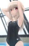  1girl armpits arms_behind_head arms_up bangs black_swimsuit blush breasts fate/kaleid_liner_prisma_illya fate_(series) hair_between_eyes highres illyasviel_von_einzbern long_hair looking_at_viewer one-piece_swimsuit red_eyes sidelocks siraha small_breasts swimsuit wet white_hair 